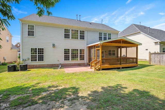 2021 Patapsco Dr, Apex, NC 27523 - rear view of property with a sunroom, a patio area, and a deck
