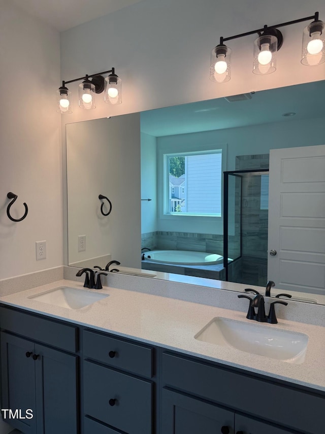 3731 Lebrun Path Unit 150Gunnison Cl, Fuquay Varina, NC 27526 - full bathroom with double vanity, a stall shower, and a bath