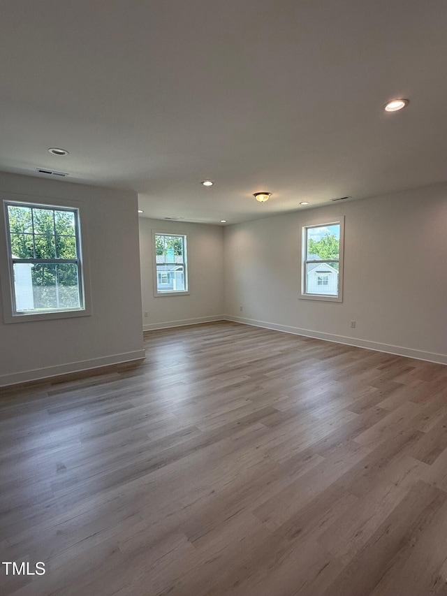 3731 Lebrun Path Unit 150Gunnison Cl, Fuquay Varina, NC 27526 - empty room featuring wood finished floors and recessed lighting