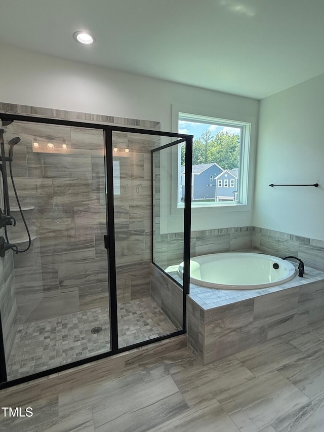 3731 Lebrun Path Unit 150Gunnison Cl, Fuquay Varina, NC 27526 - full bathroom with a bath, a shower stall, and tile patterned flooring
