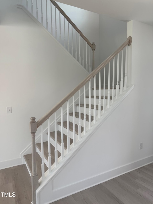 3731 Lebrun Path Unit 150Gunnison Cl, Fuquay Varina, NC 27526 - staircase featuring wood finished floors and baseboards