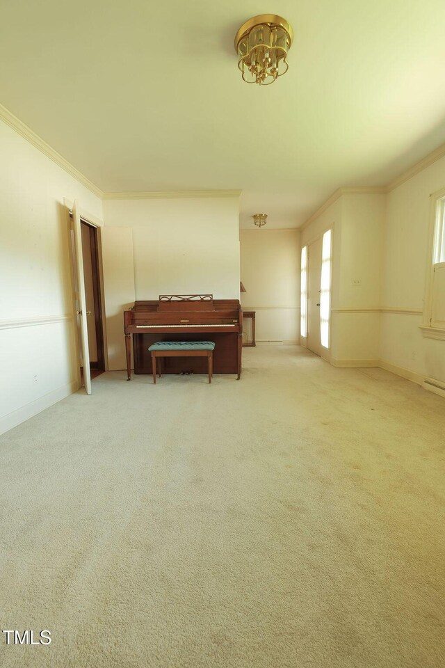 1801 Bethlehem Rd, Rocky Mount, NC 27803 - carpeted empty room with ornamental molding and a chandelier