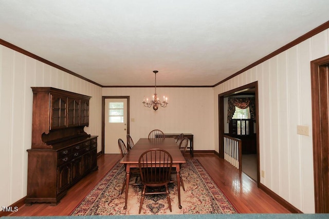 1801 Bethlehem Rd, Rocky Mount, NC 27803 - dining area featuring crown molding, wood finished floors, and a chandelier