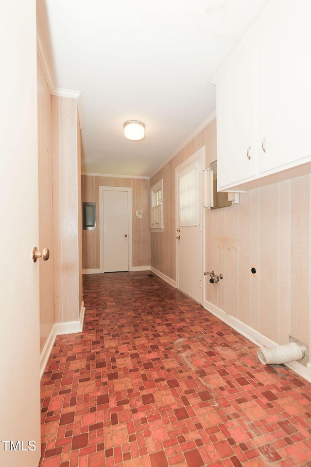 1801 Bethlehem Rd, Rocky Mount, NC 27803 - washroom with cabinet space, brick patterned floors, and crown molding