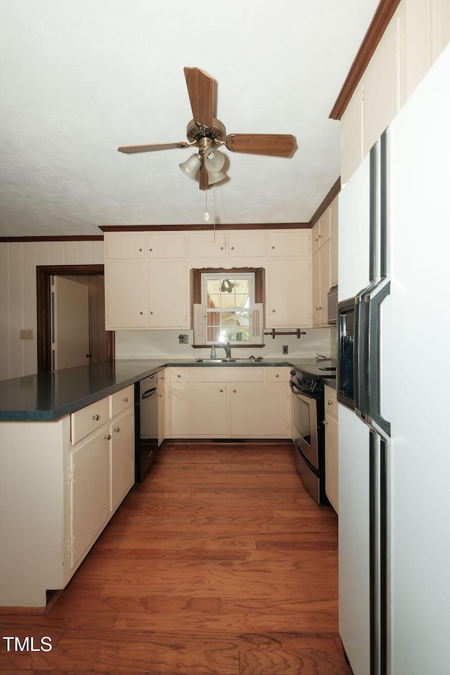 1801 Bethlehem Rd, Rocky Mount, NC 27803 - kitchen with white fridge with ice dispenser, stainless steel range with electric cooktop, dishwashing machine, a peninsula, and a ceiling fan