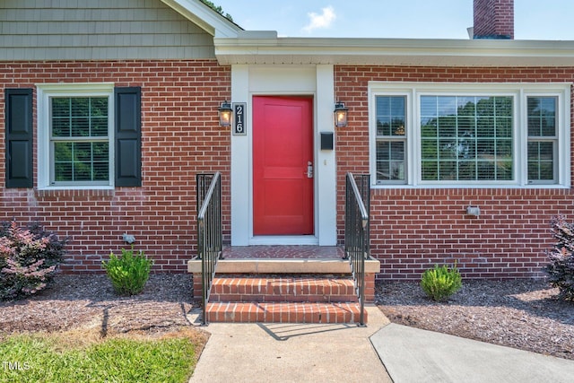 216 Whitfield St, Enfield, NC 27823 - entrance to property with brick siding and a chimney