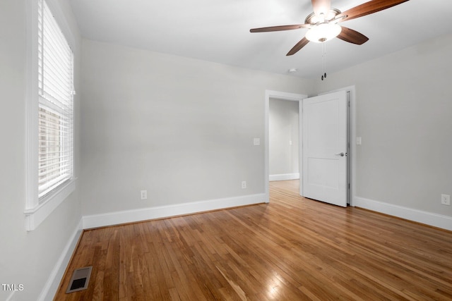 216 Whitfield St, Enfield, NC 27823 - empty room featuring hardwood / wood-style floors and ceiling fan