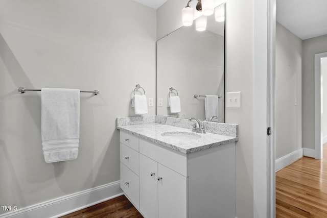 216 Whitfield St, Enfield, NC 27823 - bathroom with vanity and wood finished floors