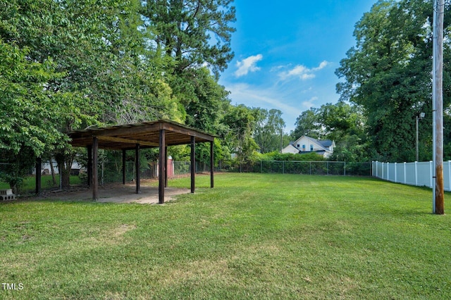 216 Whitfield St, Enfield, NC 27823 - view of yard featuring a carport