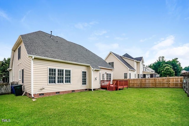 5933 Big Nance Dr, Raleigh, NC 27616 - rear view of property featuring crawl space, a wooden deck, a fenced backyard, and a shingled roof