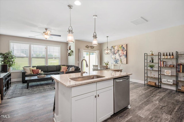 1119 Latitude Dr, Durham, NC 27713 - kitchen featuring dishwasher, dark wood finished floors, plenty of natural light, and pendant lighting