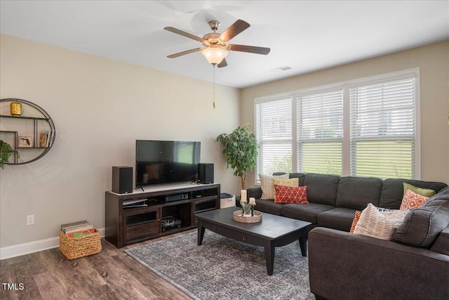 1119 Latitude Dr, Durham, NC 27713 - living area with wood finished floors and ceiling fan