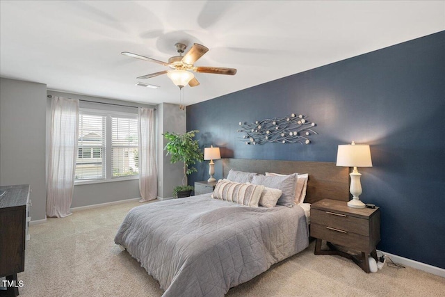 1119 Latitude Dr, Durham, NC 27713 - carpeted bedroom featuring baseboards and ceiling fan