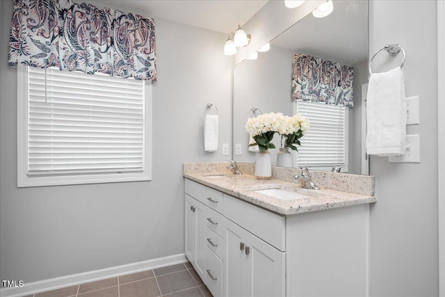 1119 Latitude Dr, Durham, NC 27713 - full bathroom featuring double vanity and tile patterned floors
