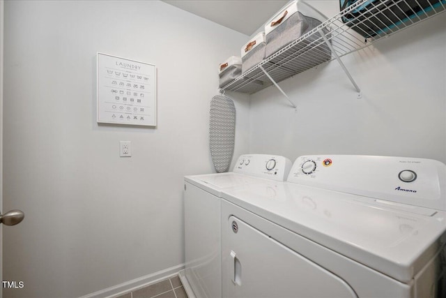 1119 Latitude Dr, Durham, NC 27713 - laundry area featuring washing machine and dryer and tile patterned flooring