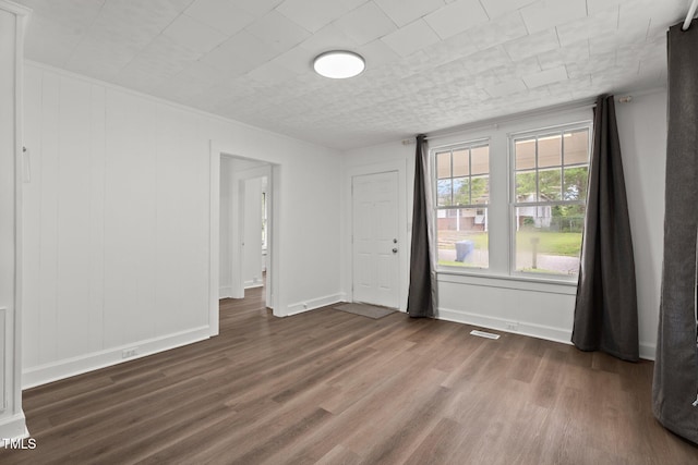 919 College Cir N, Wilson, NC 27893 - spare room with dark wood-type flooring and baseboards
