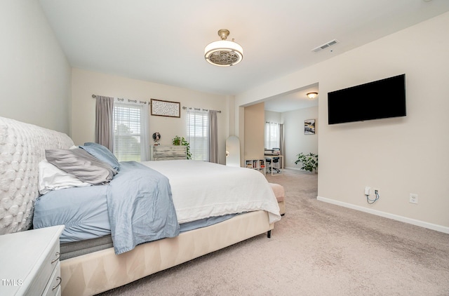3922 Cross Timber Ln, Raleigh, NC 27603 - bedroom featuring light carpet and baseboards