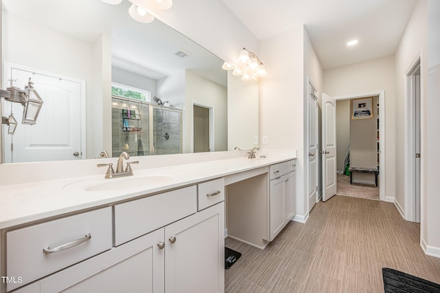 3922 Cross Timber Ln, Raleigh, NC 27603 - full bath featuring double vanity, a stall shower, and recessed lighting