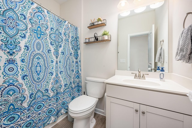 3922 Cross Timber Ln, Raleigh, NC 27603 - full bath with vanity, wood finished floors, and a shower with curtain