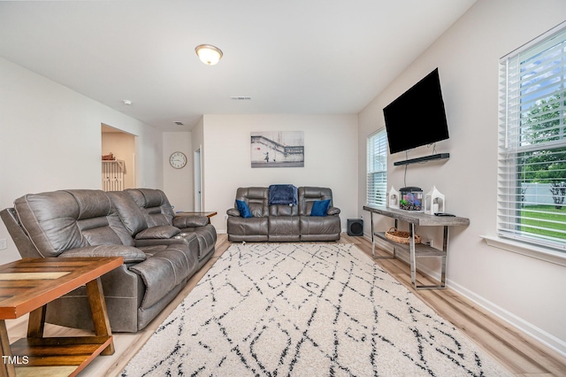3922 Cross Timber Ln, Raleigh, NC 27603 - living room with wood finished floors and baseboards