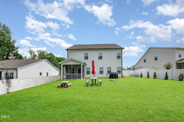 3922 Cross Timber Ln, Raleigh, NC 27603 - back of house featuring a sunroom and a fenced backyard