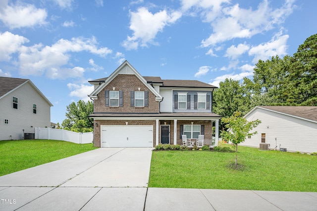 3922 Cross Timber Ln, Raleigh, NC 27603 - view of front of home with brick siding, a garage, driveway, and a porch
