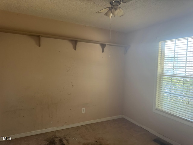 165 Cambridge Elm Dr, Clayton, NC 27520 - empty room featuring a textured ceiling and ceiling fan