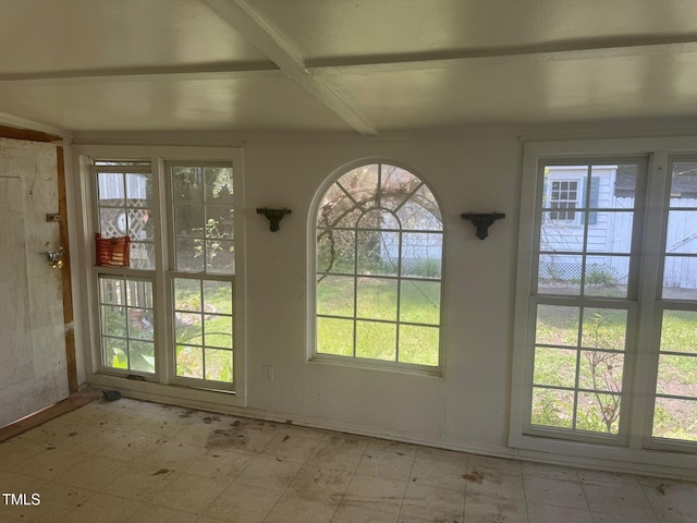 165 Cambridge Elm Dr, Clayton, NC 27520 - doorway to outside featuring tile patterned floors and beam ceiling