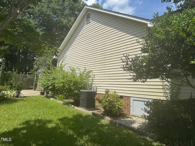 165 Cambridge Elm Dr, Clayton, NC 27520 - view of side of property featuring a central air condition unit and crawl space
