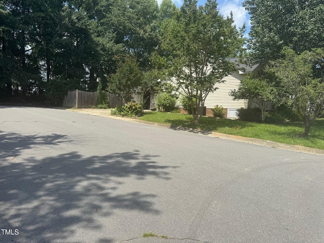 165 Cambridge Elm Dr, Clayton, NC 27520 - view of asphalt street with curbs