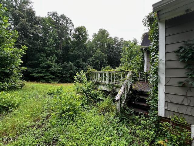 3573 River View Cir, Oxford, NC 27565 - view of yard with a wooden deck