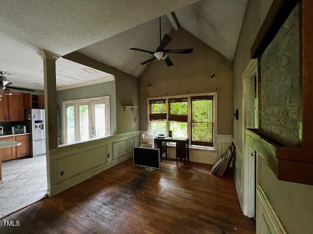 3573 River View Cir, Oxford, NC 27565 - living area with ceiling fan, plenty of natural light, wood-type flooring, a decorative wall, and a wainscoted wall