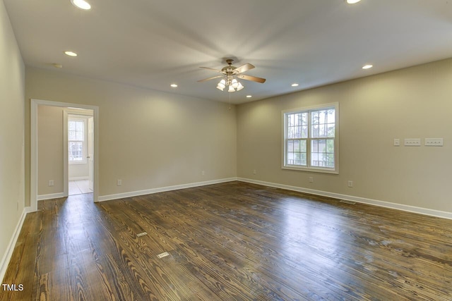 619 Rudy Dr, Clayton, NC 27520 - spare room featuring a ceiling fan, dark wood-style floors, and recessed lighting