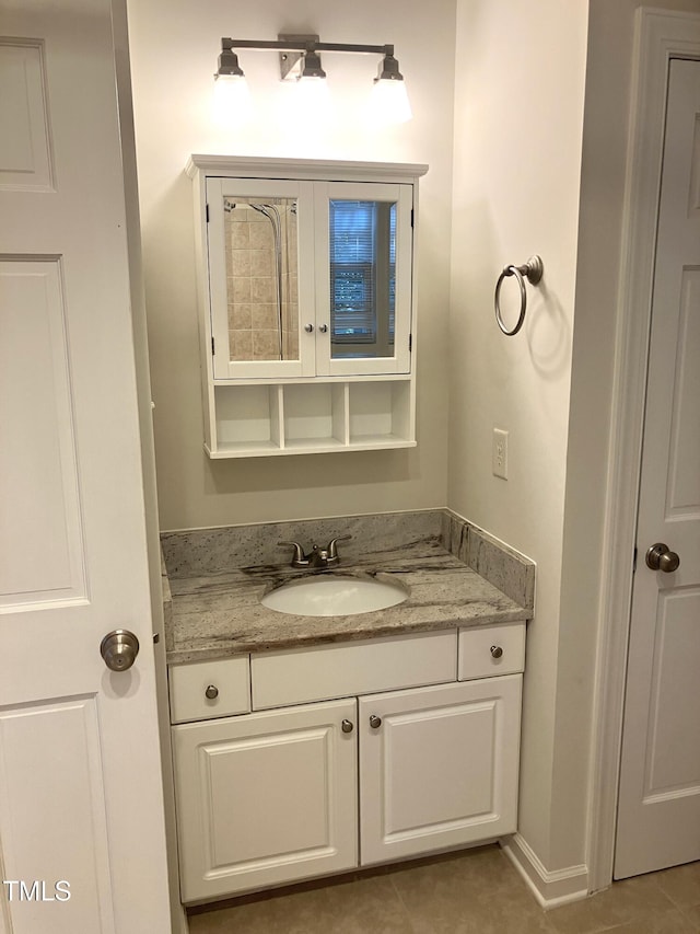 619 Rudy Dr, Clayton, NC 27520 - bathroom with vanity and tile patterned floors