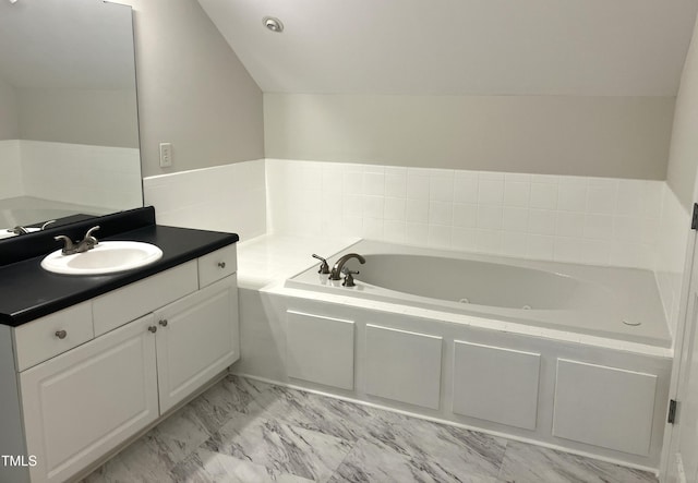 619 Rudy Dr, Clayton, NC 27520 - full bath with vanity, a jetted tub, and marble look tile flooring