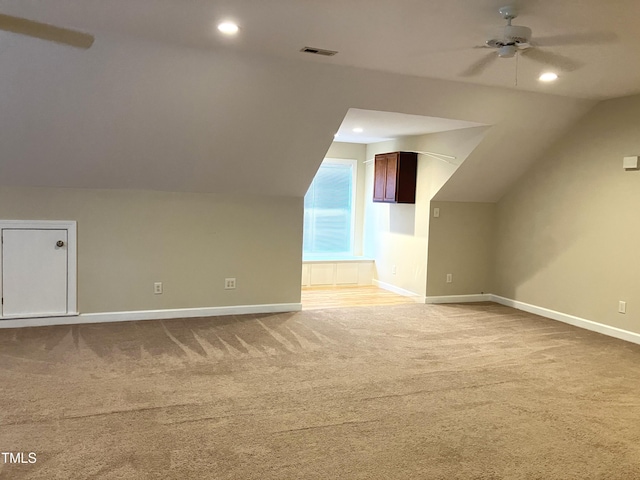 619 Rudy Dr, Clayton, NC 27520 - bonus room featuring vaulted ceiling, carpet floors, ceiling fan, and recessed lighting