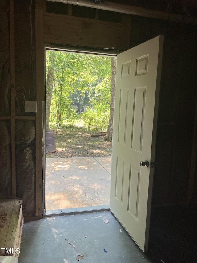 619 Rudy Dr, Clayton, NC 27520 - doorway to outside with unfinished concrete floors