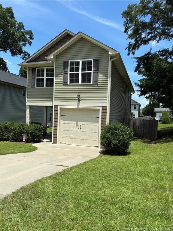 914 W Rowan St SW, Fayetteville, NC 28301 - view of property exterior featuring an attached garage and driveway