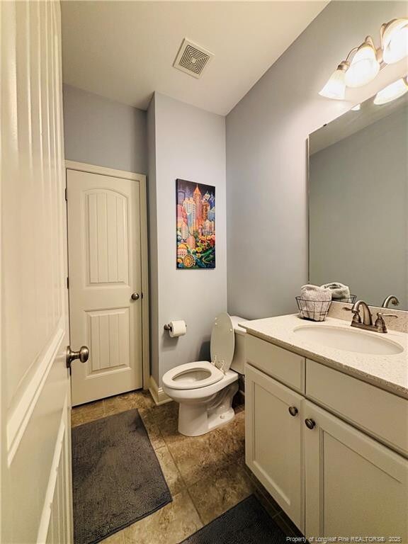 914 W Rowan St SW, Fayetteville, NC 28301 - bathroom with vanity and toilet