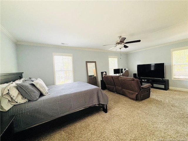 914 W Rowan St SW, Fayetteville, NC 28301 - carpeted bedroom with multiple windows, ornamental molding, and a ceiling fan
