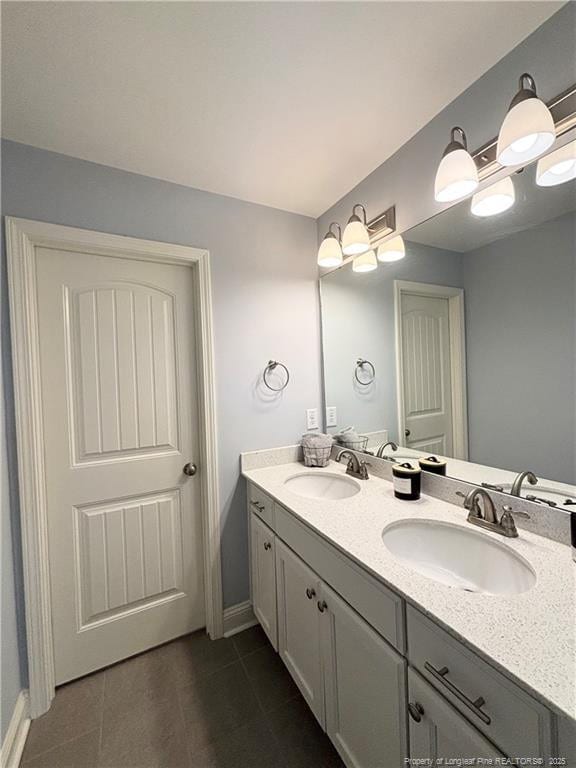 914 W Rowan St SW, Fayetteville, NC 28301 - full bathroom featuring tile patterned flooring and double vanity