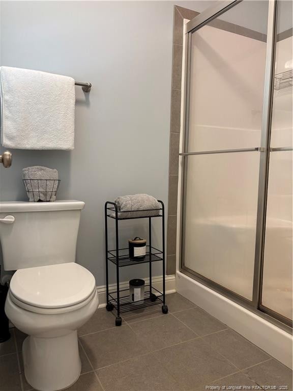 914 W Rowan St SW, Fayetteville, NC 28301 - full bathroom with tile patterned flooring and a stall shower