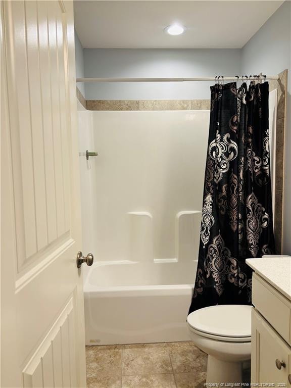 914 W Rowan St SW, Fayetteville, NC 28301 - bathroom featuring vanity and shower / tub combo with curtain