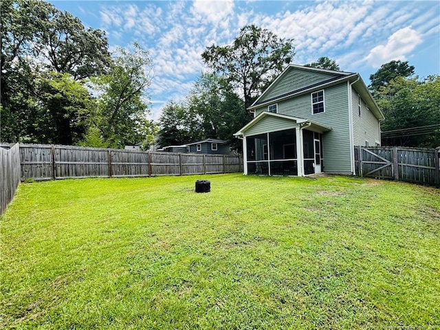 914 W Rowan St SW, Fayetteville, NC 28301 - fenced backyard with a sunroom