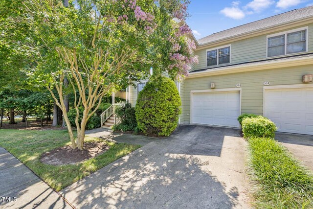 203 Bluefield Rd, Chapel Hill, NC 27517 - view of front of property featuring an attached garage and concrete driveway