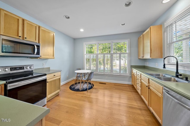 203 Bluefield Rd, Chapel Hill, NC 27517 - kitchen with appliances with stainless steel finishes, light wood-style flooring, recessed lighting, and light brown cabinets