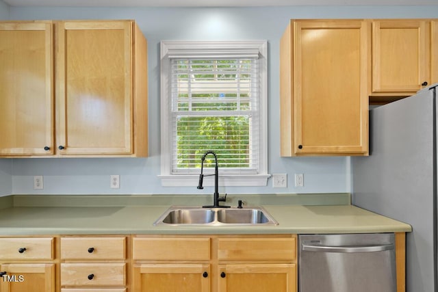 203 Bluefield Rd, Chapel Hill, NC 27517 - kitchen with stainless steel dishwasher, light brown cabinets, and light countertops
