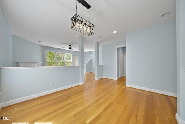 203 Bluefield Rd, Chapel Hill, NC 27517 - unfurnished room featuring ceiling fan, light wood-style flooring, recessed lighting, and stairway