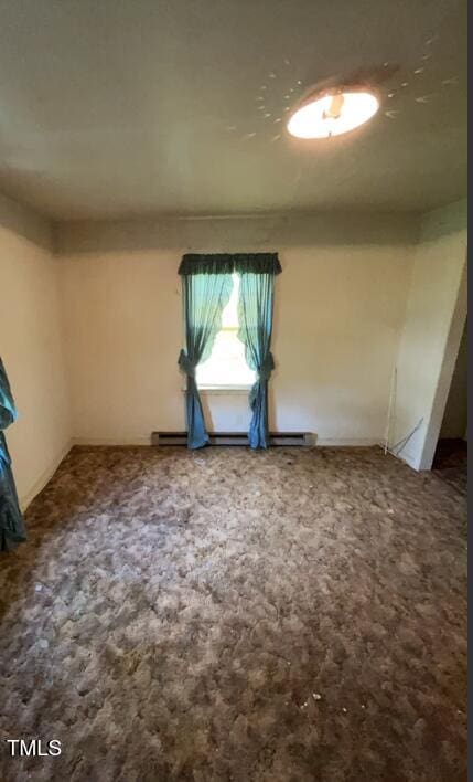 2035 Simpkins Rd, Raleigh, NC 27603 - unfurnished room with carpet flooring and a baseboard radiator
