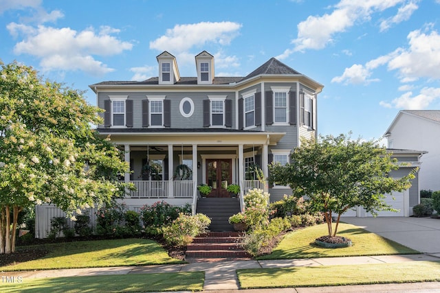 1501 Heritage Reserve Ct, Wake Forest, NC 27587 - view of front of home with covered porch, a front lawn, stairs, and concrete driveway